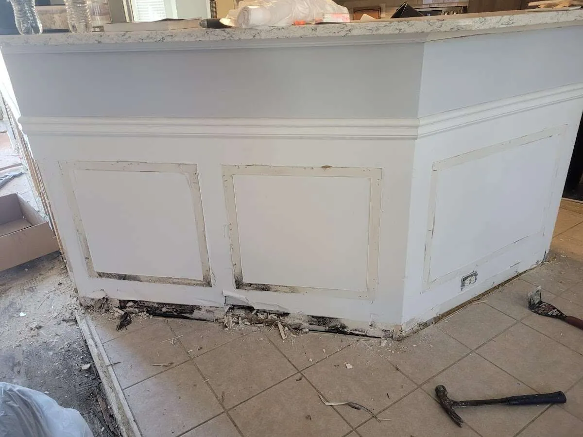 Water damage and mold on kitchen during Sewage Cleanup & Sanitation in Orange Beach
